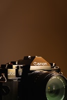 black and silver nikon dslr camera