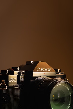 black and silver nikon dslr camera