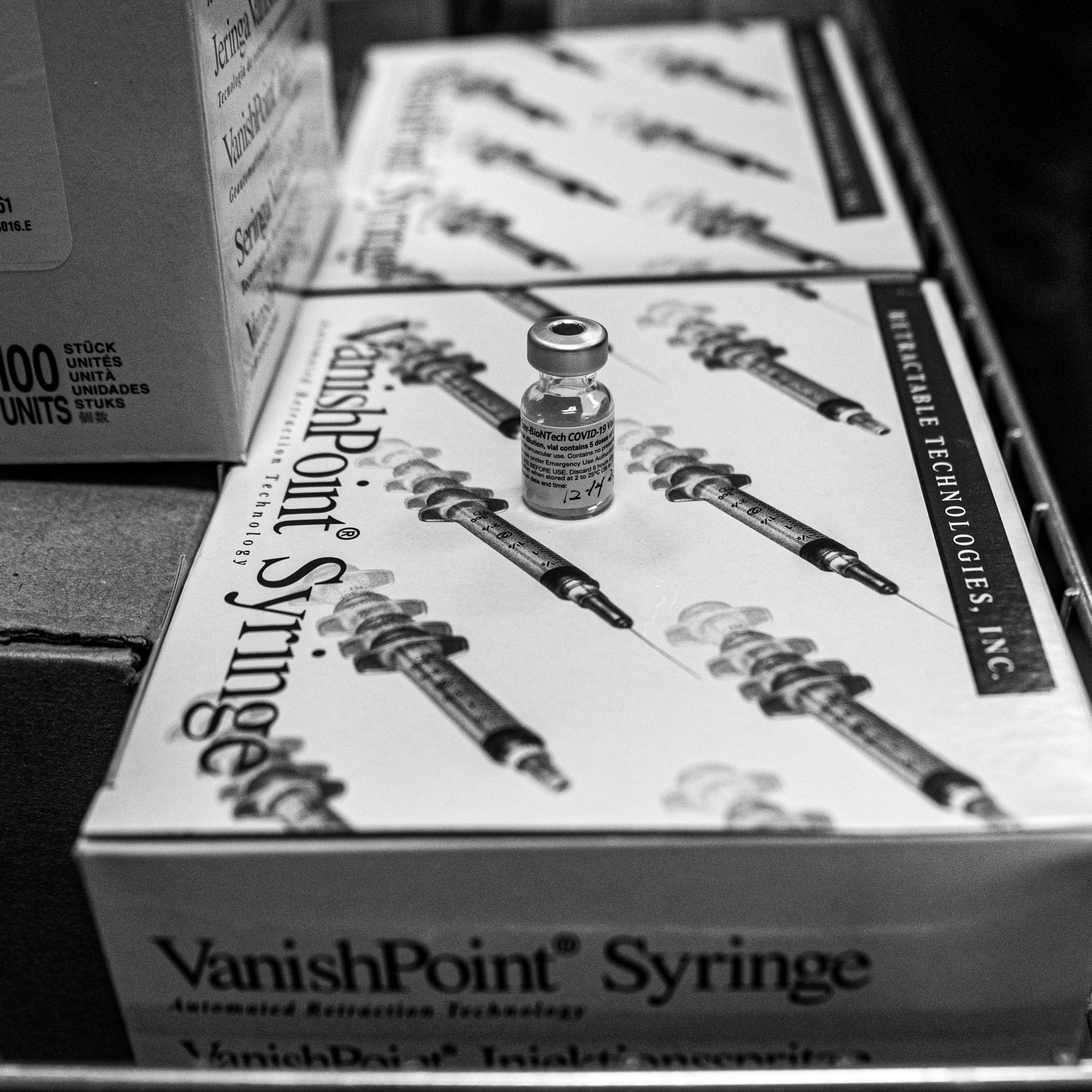 a box of varnish point syringes sitting on a table