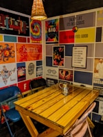 An inviting corner with cozy seating and inspirational notes pinned on a corkboard.