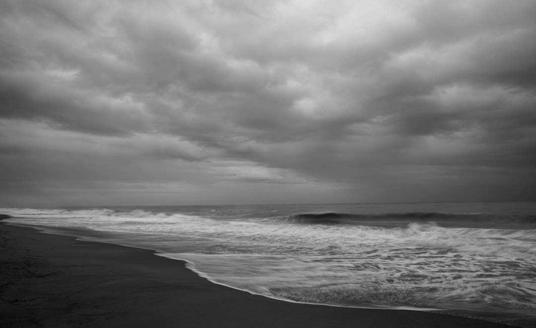 grayscale photo of ocean waves