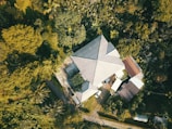 An aerial view of the manufacturing facility surrounded by greenery.