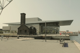 Wide shot of a modern industrial building with a newly waterproofed terrace.