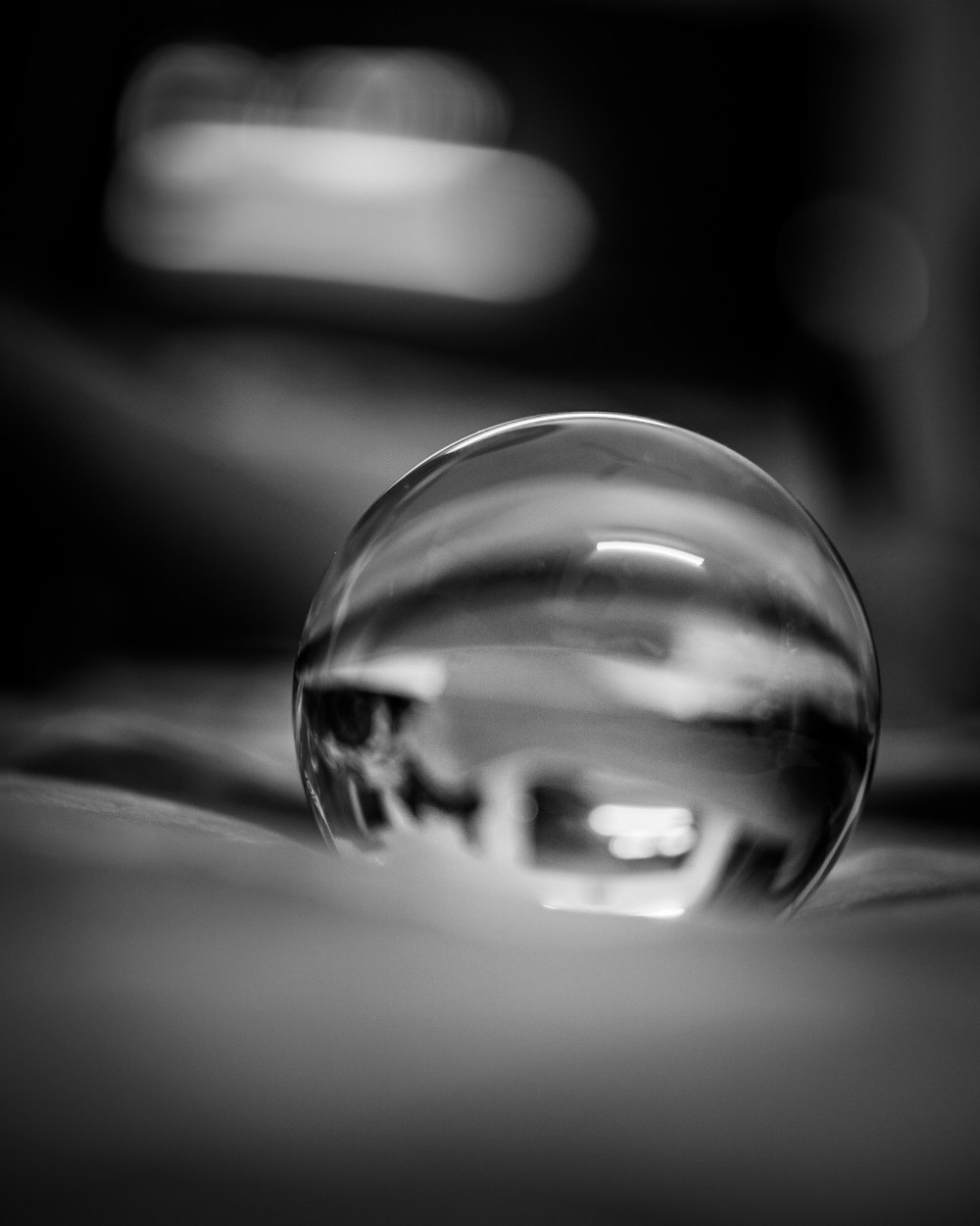 grayscale photo of water drop