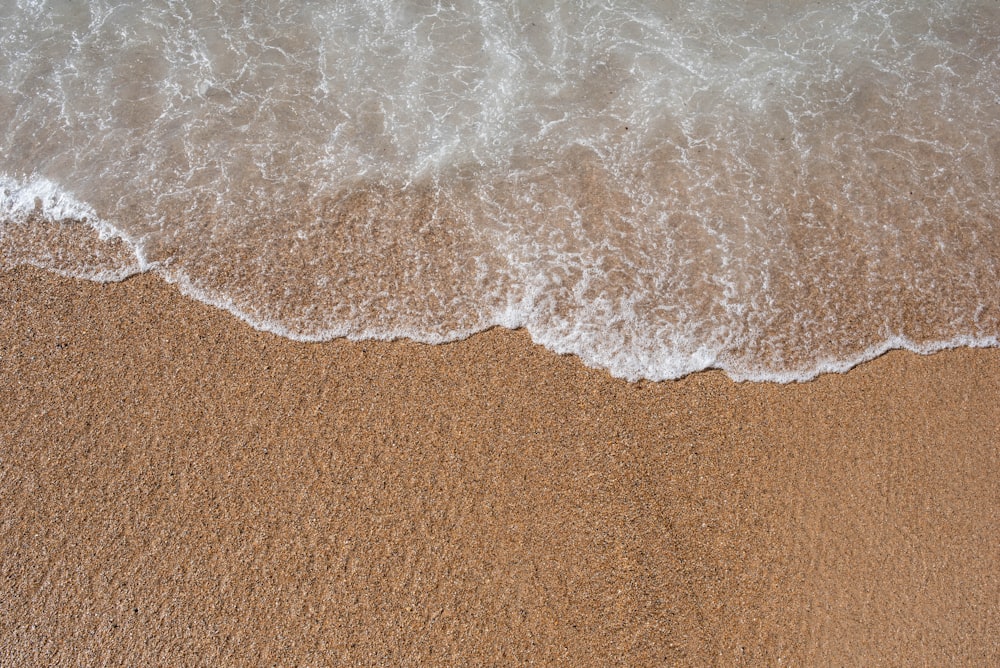 white and brown sand on brown sand