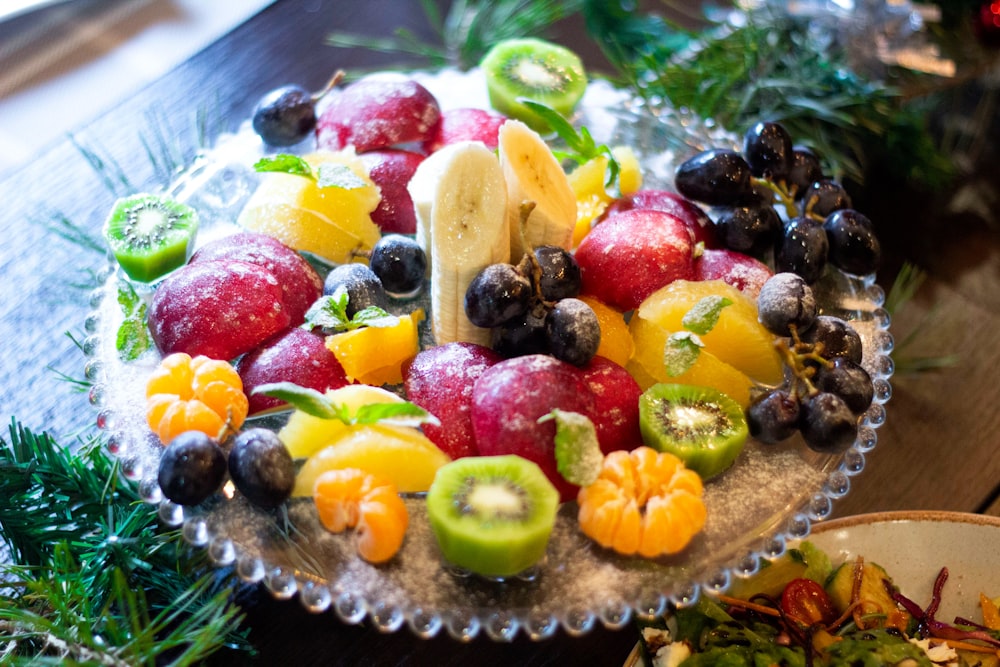 sliced fruit on clear glass bowl