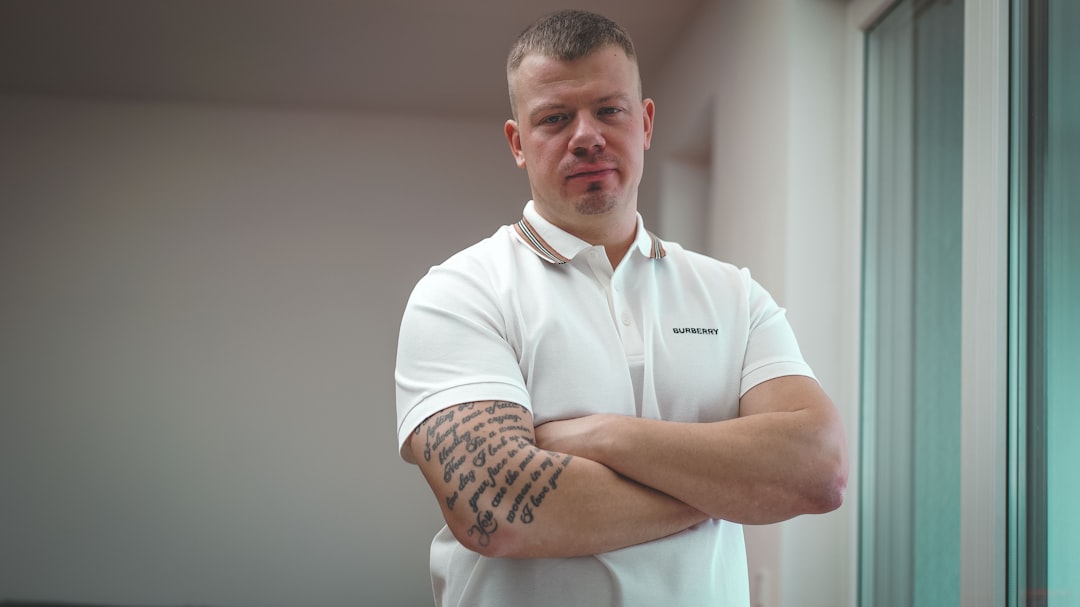 man in white polo shirt, smile