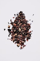 brown and black fruit on white surface