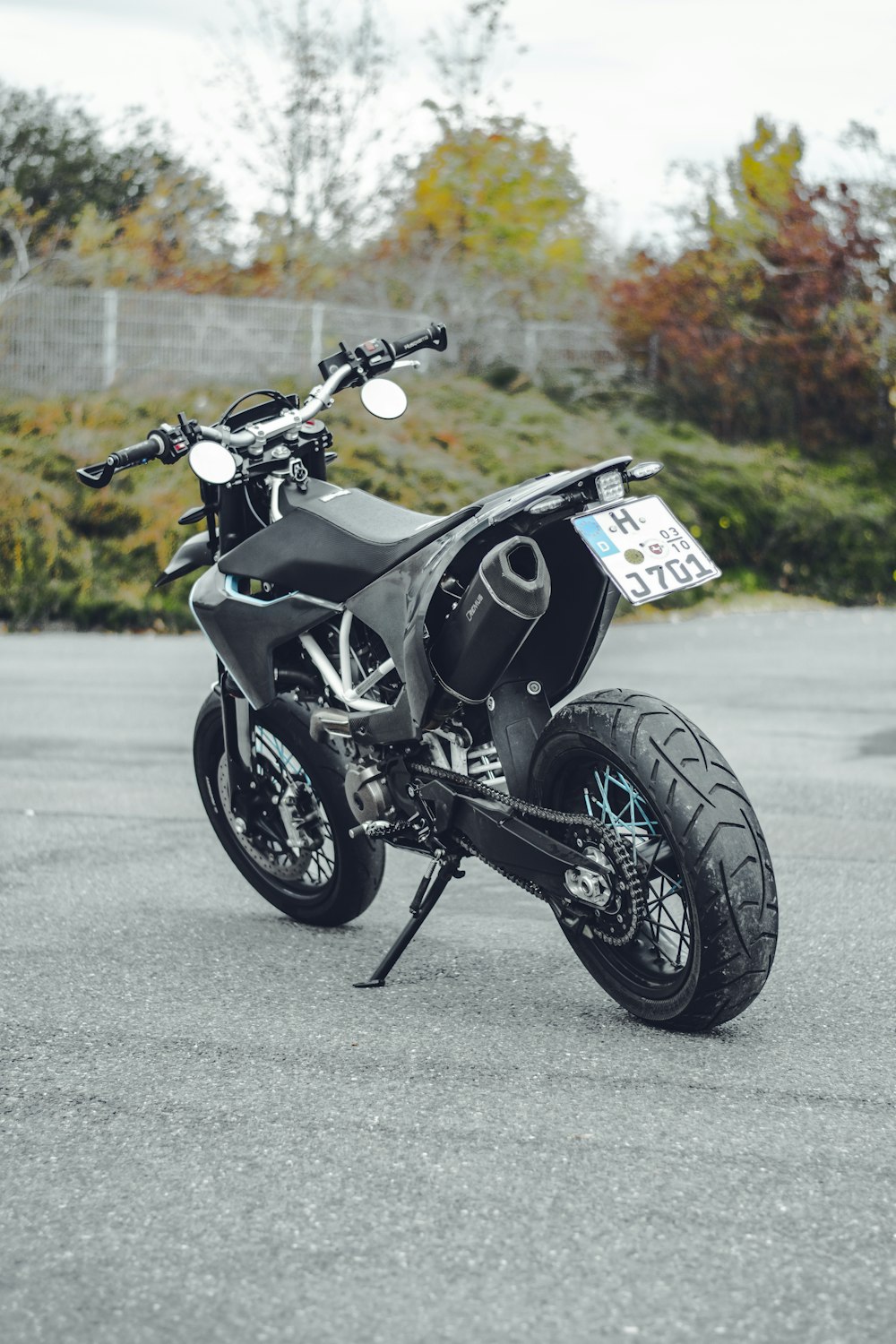 black and white sports bike on road during daytime