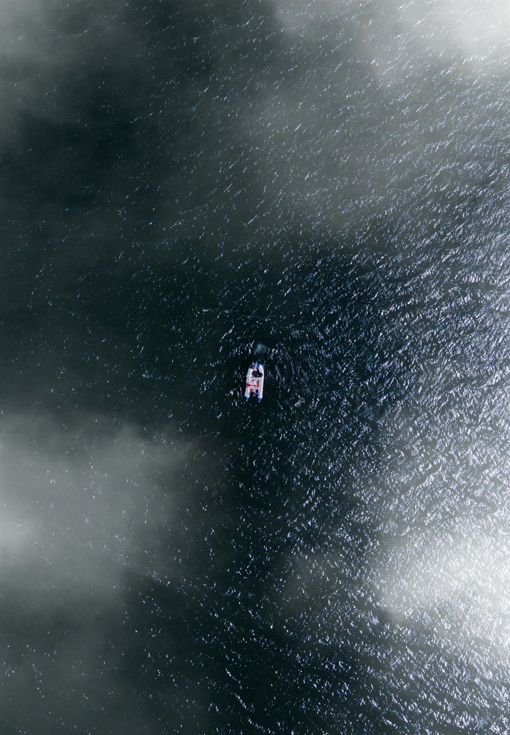 person surfing on sea during daytime