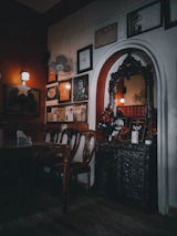 Warm, inviting interior of Moti Mahal with rustic decor and soft lighting.
