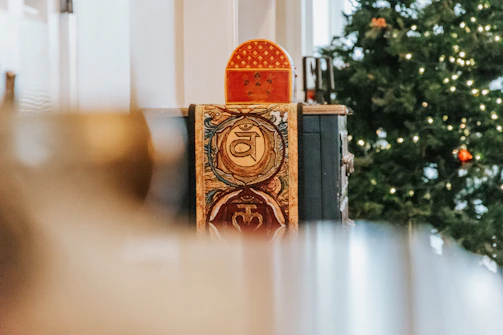 Close-up of a creative holiday decorative box with intricate patterns and vibrant colors.