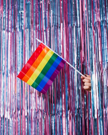 multi colored striped umbrella on wall