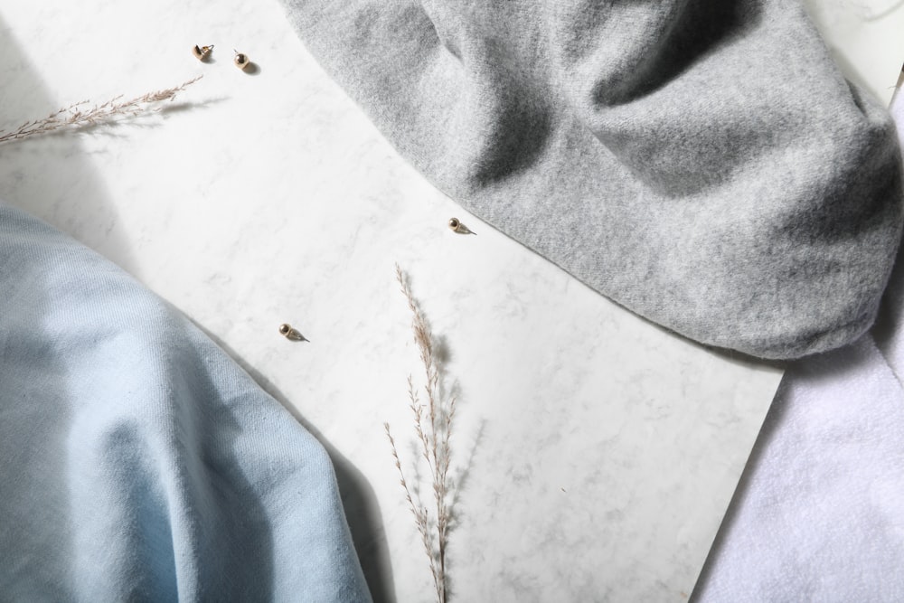 gray textile on white table