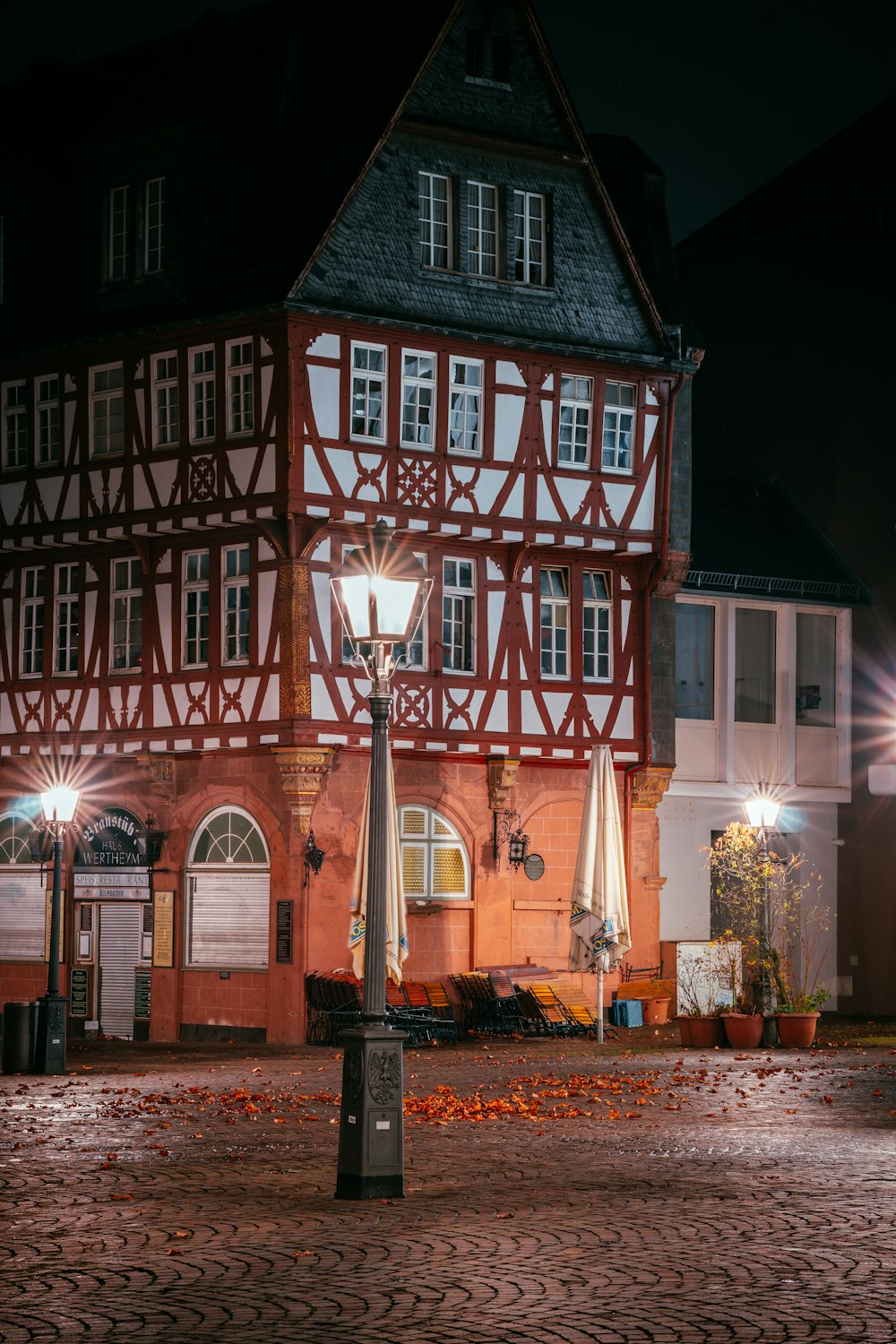 brown and white concrete building during nighttime