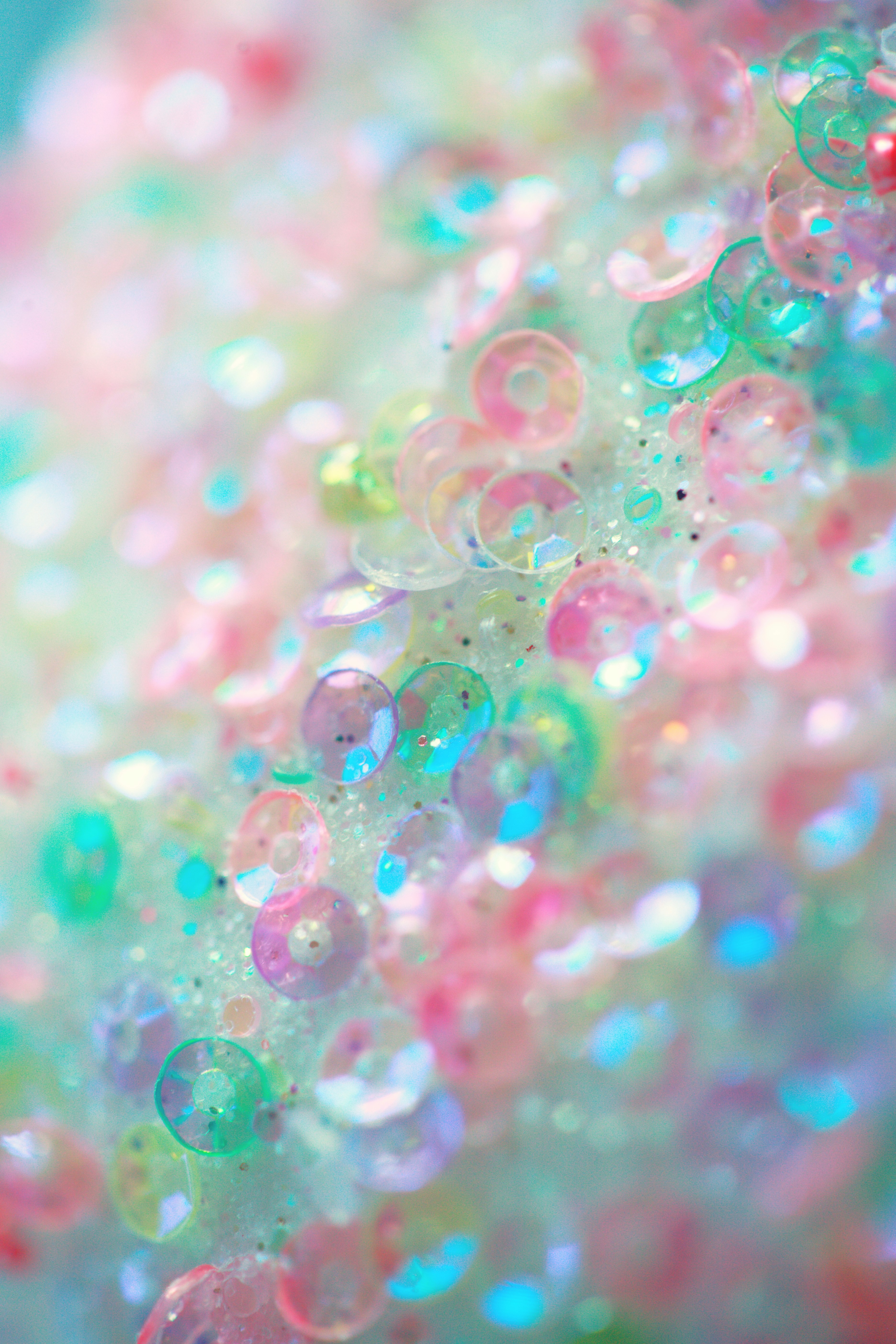 Glittery pastel colored sequins.