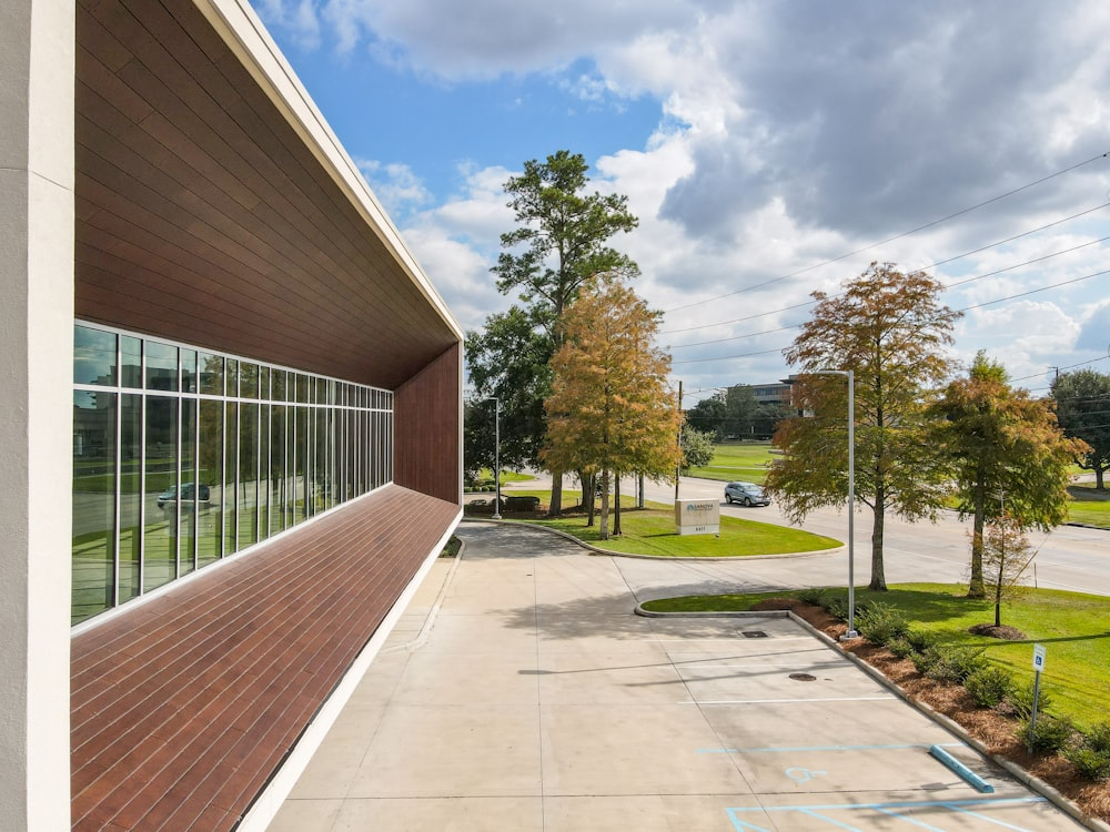 green trees near brown concrete building during daytime