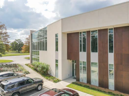 Exterior view of a cozy office building at 5801 Whisperwood Dr, Durham.