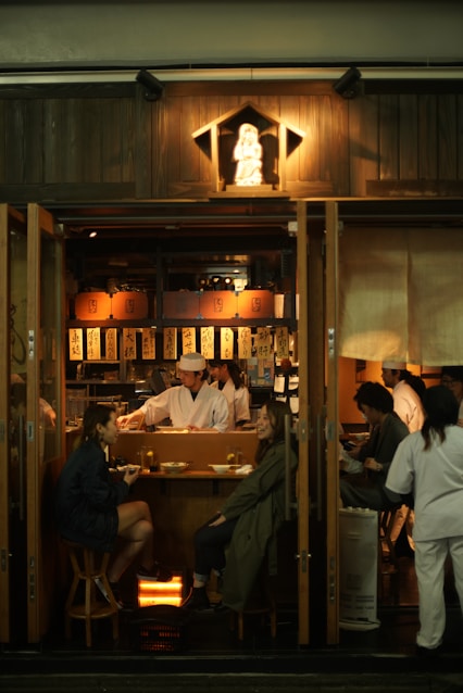 people sitting at the table inside restaurant
