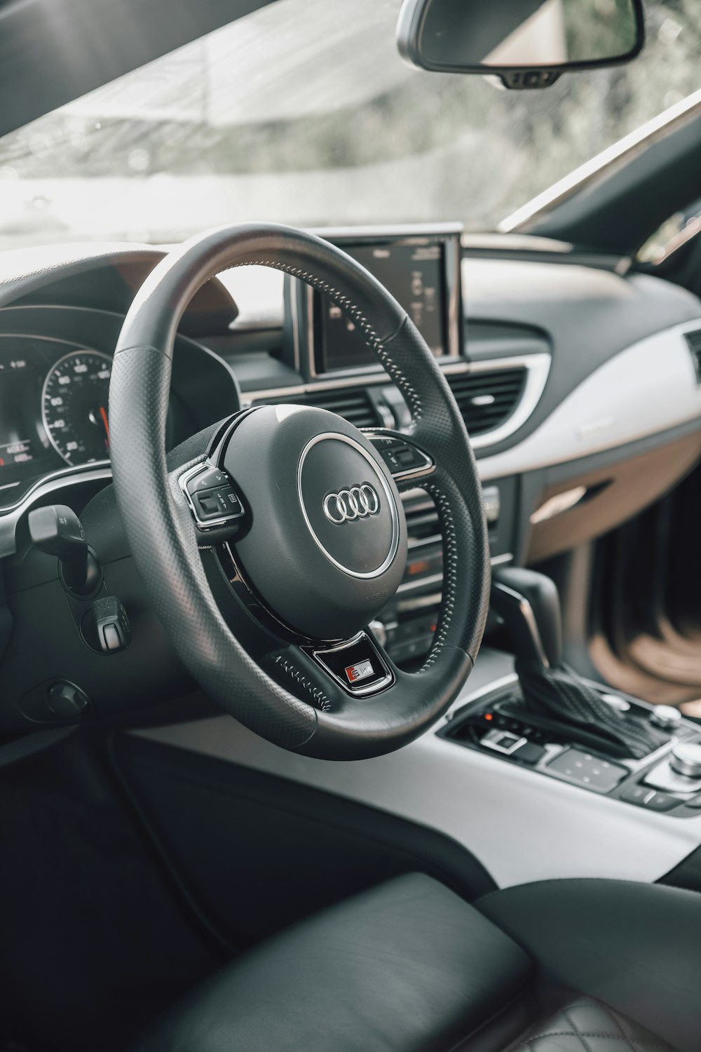 black and silver audi steering wheel