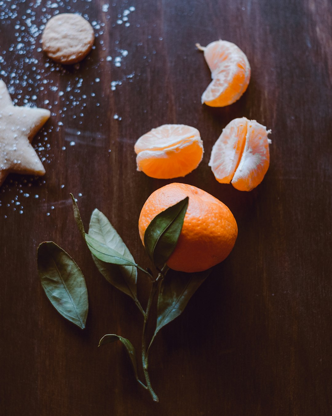 orange fruits on brown wooden table