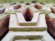 Close-up of a decorative resin pattern on an interior wall.