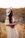 woman in white dress playing acoustic guitar