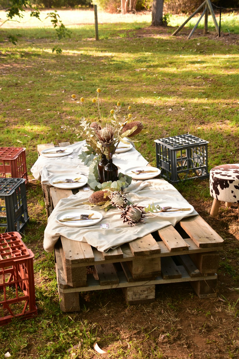 white and black floral table cloth on brown wooden table