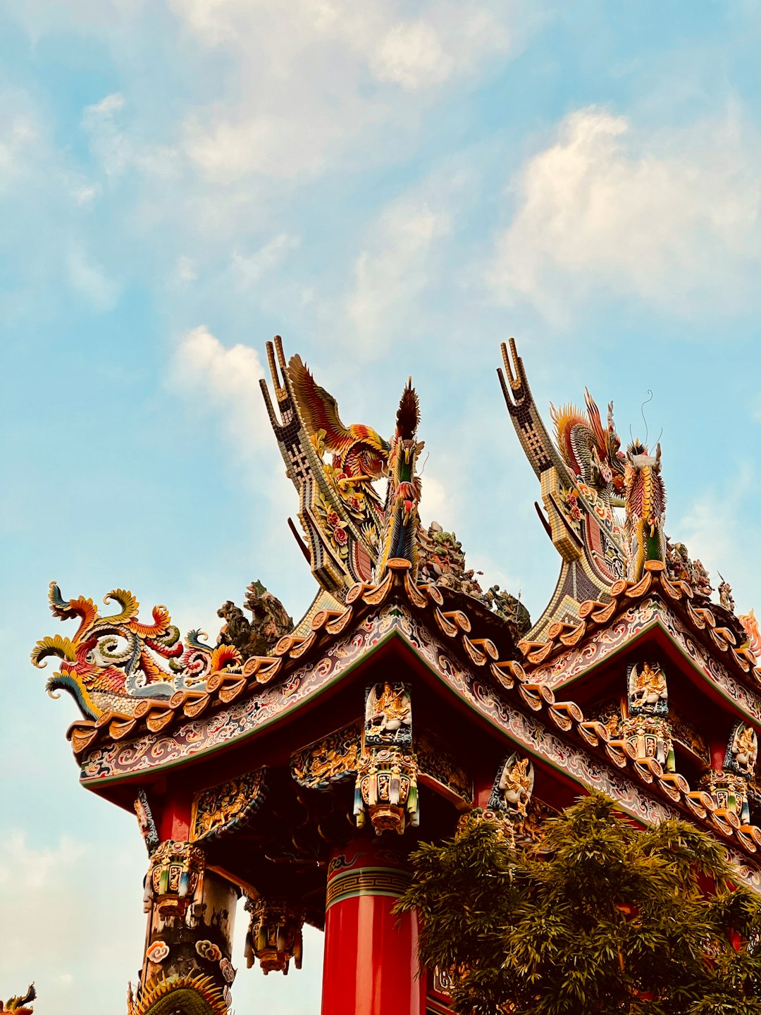 red and brown chinese temple under blue sky during daytime