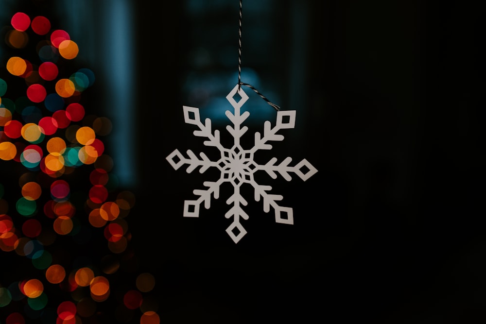 white and black snowflake illustration