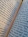 An open book with visible printed text on its pages. The pages are slightly tilted, with clear, readable words in a typical serif font. The text appears to be in English and discusses topics related to medical procedures or situations.