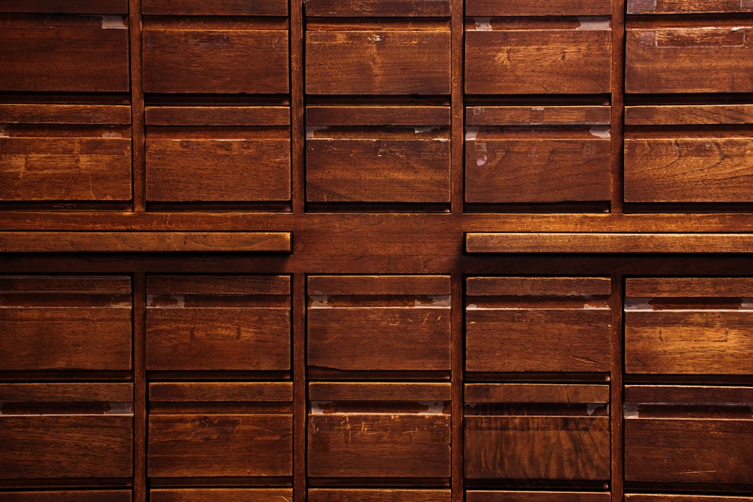 brown wooden door with white door lever