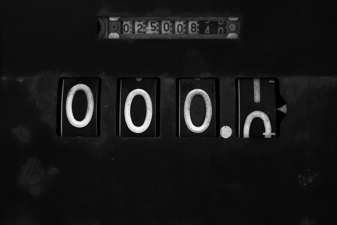 a black and white photo of the word boo on a machine