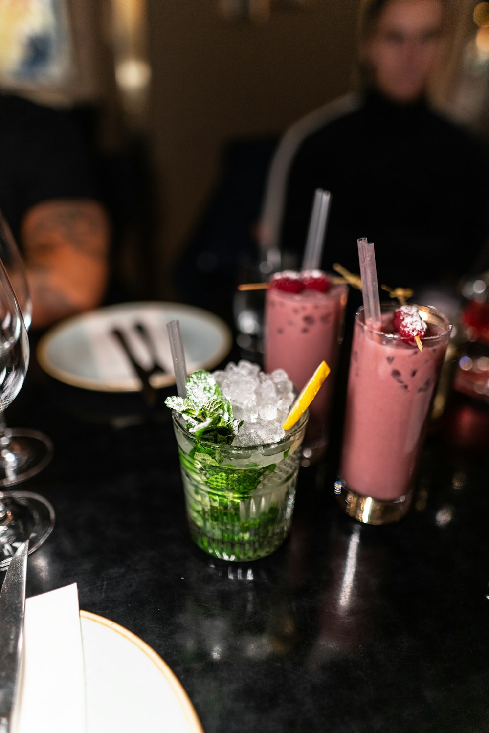 pink juice in clear drinking glass