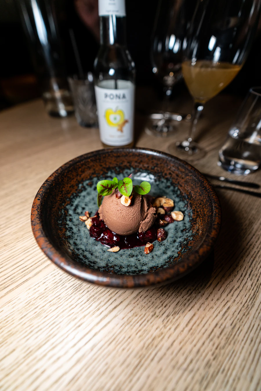Rich chocolate dessert on a warm ceramic plate