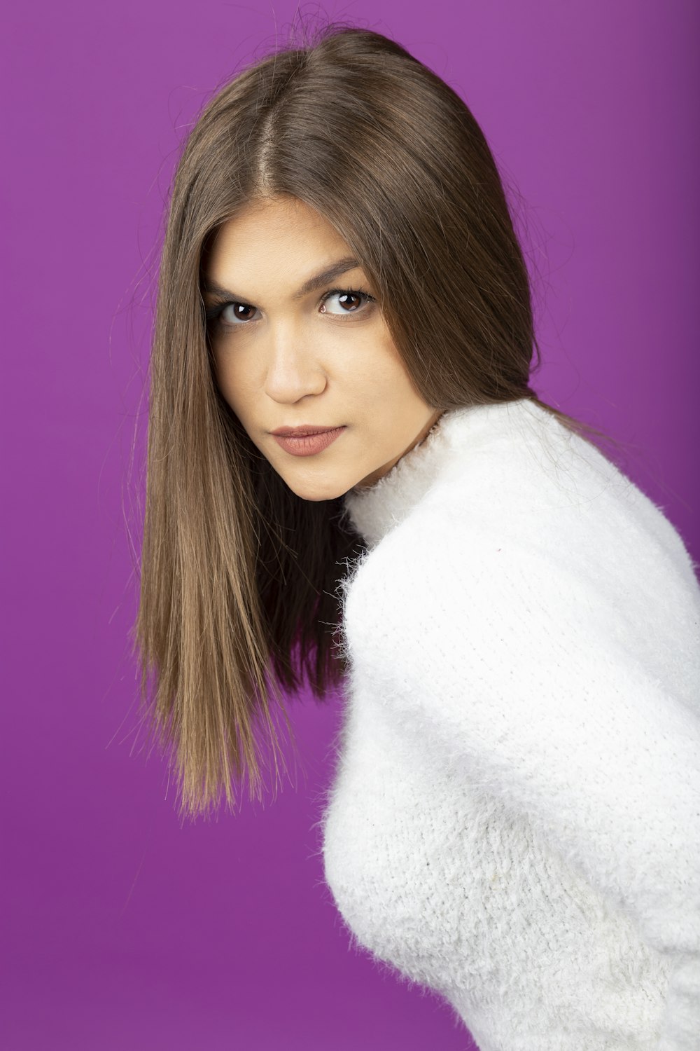 woman in white fur coat