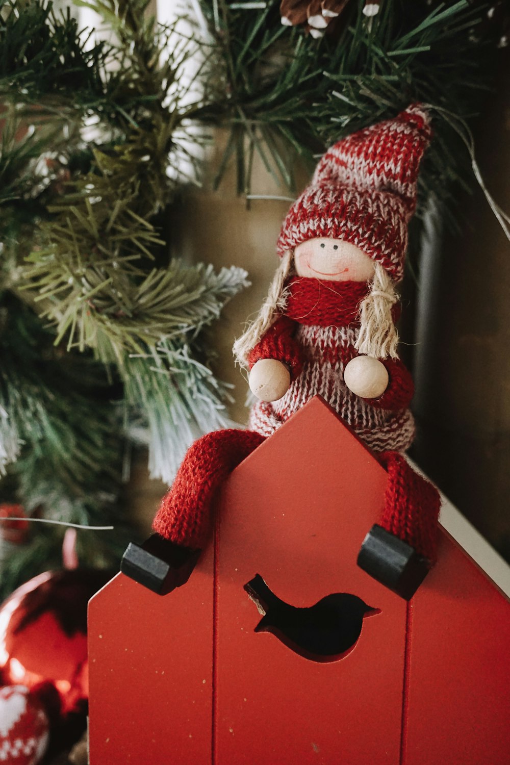 red and white plush toy