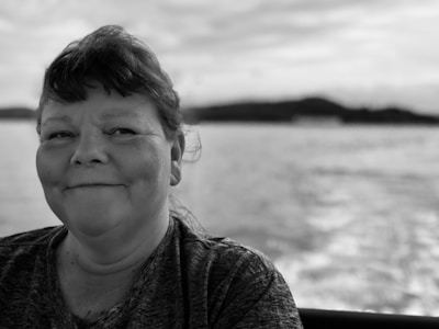 A serene photo of a person smiling peacefully, symbolizing regained privacy and freedom.