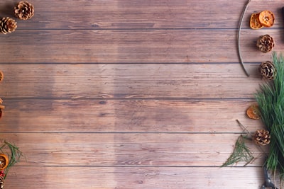 green leaf on brown wooden floor greetings zoom background