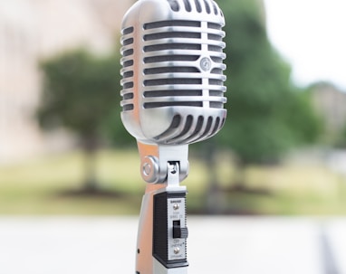 silver microphone on white table