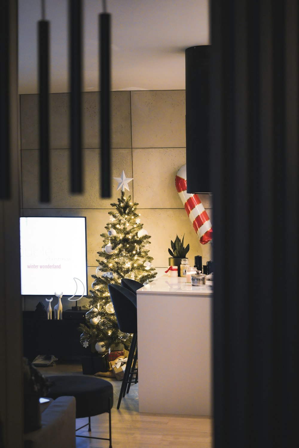 green christmas tree on white wooden desk