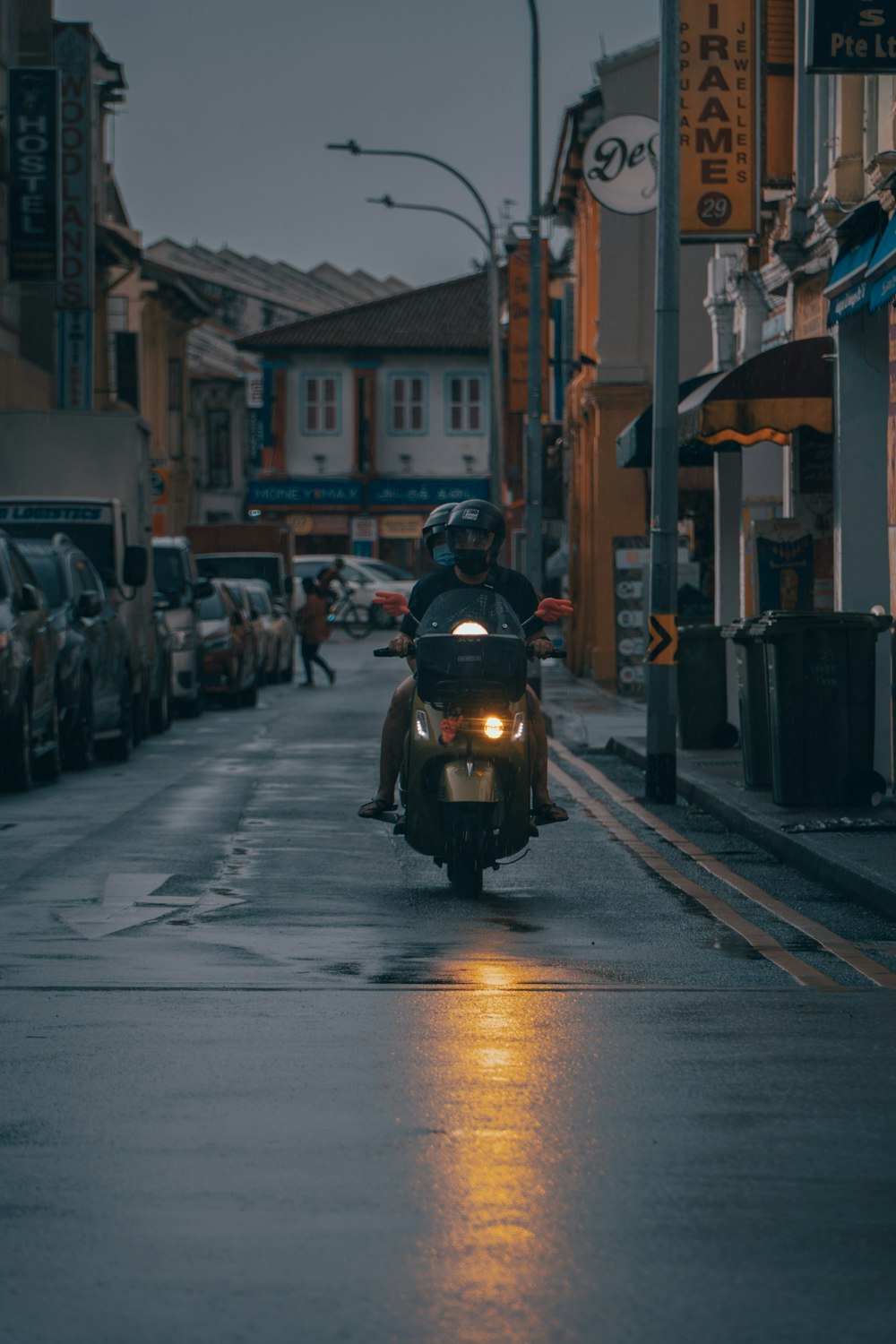 people walking on street during night time