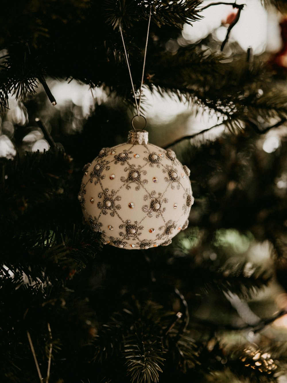 white and silver christmas bauble