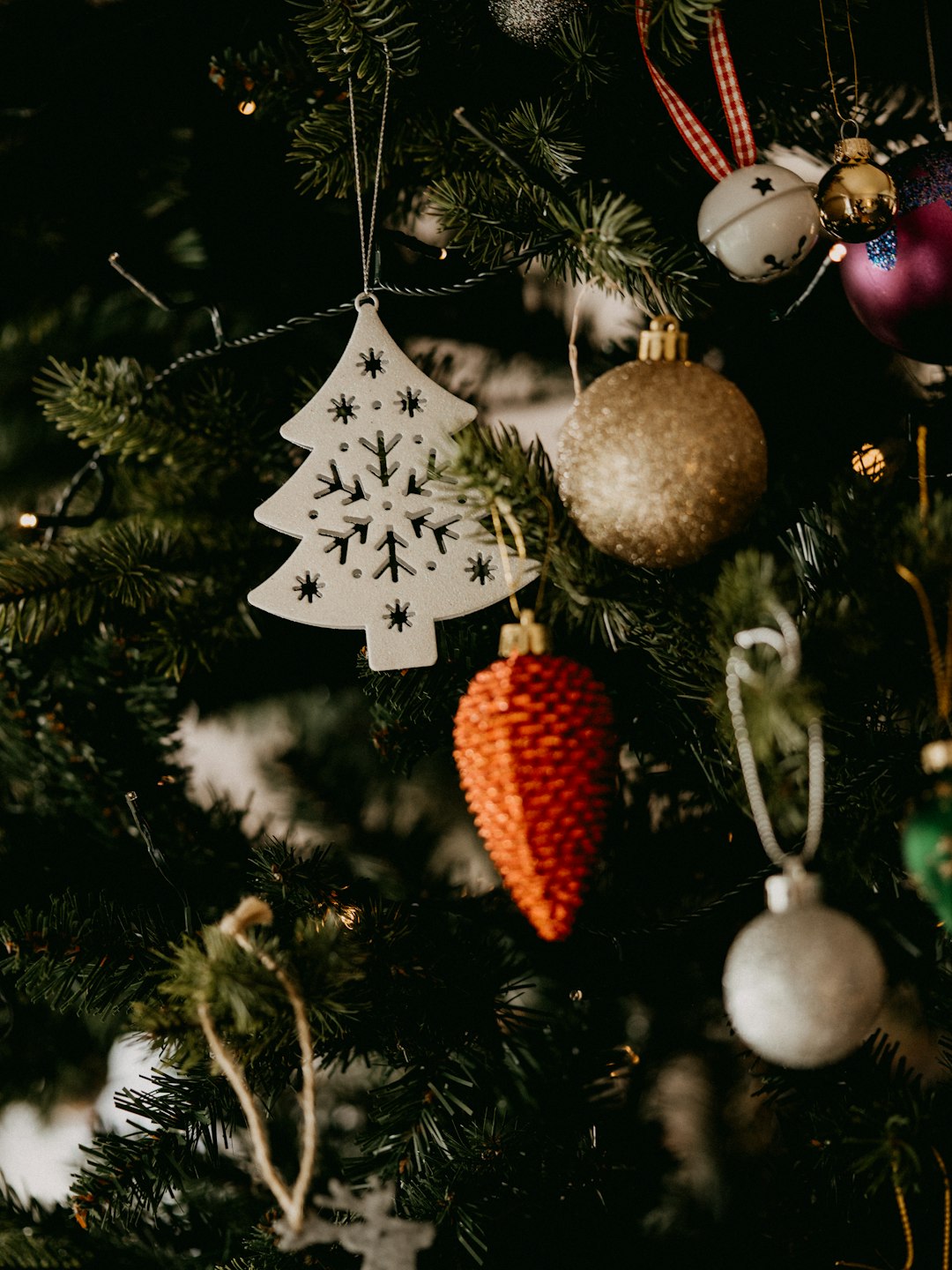 gold and red baubles on christmas tree