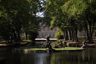 A serene view of Taman Sari Gunongan with lush greenery and historical architecture.