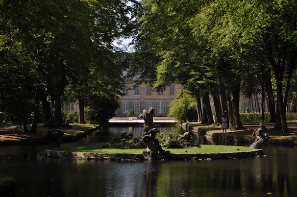 The serene lotus pond and ancient trees inside Changdeokgung Palace's Secret Garden.
