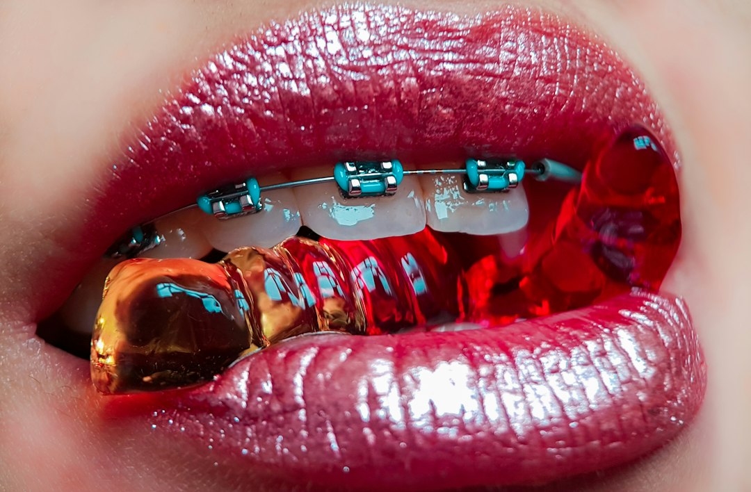 person with red lipstick and red lipstick,