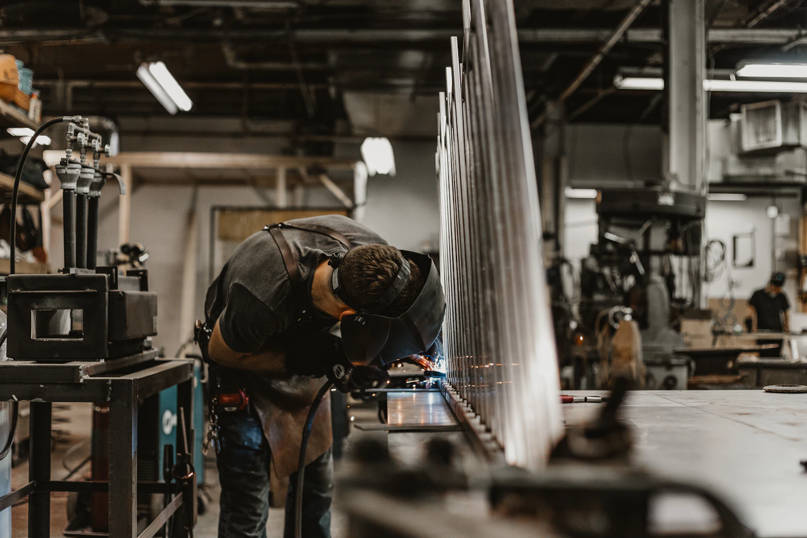 A worker on a manufacturing floor