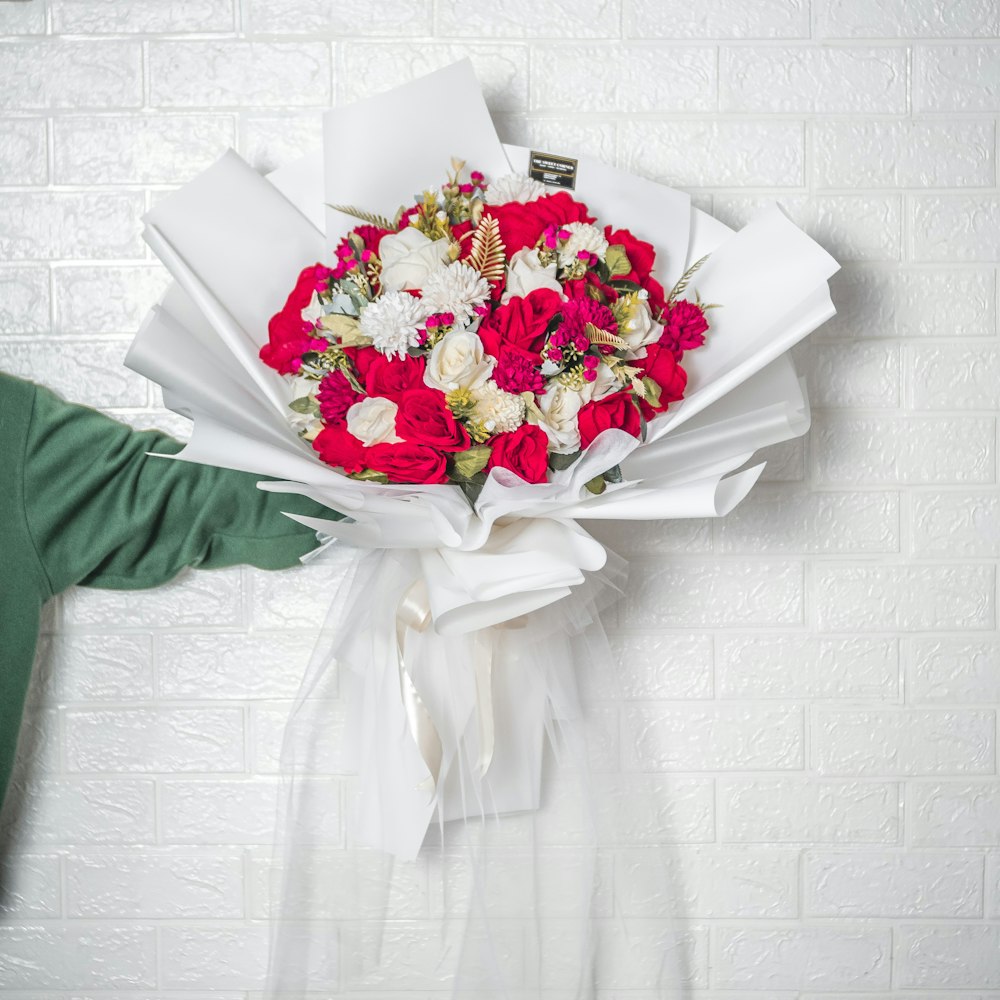 white and red flower bouquet