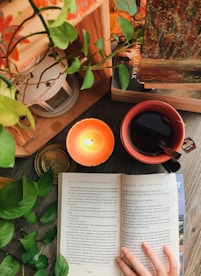 orange ceramic mug on brown wooden table